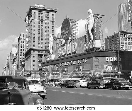 1950S New York City Times Square With Massive Bond Clothing Sign Between 44Th And 45Th Streets View Large Photo Image Stock Image - 1950S New York City Times Square With Massive Bond Clothing Sign Between 44Th And 45Th Streets. Fotosearch