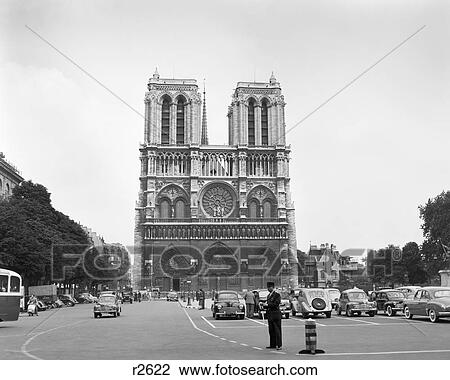 1950s NOTRE DAME CATHEDRAL SINGLE ANONYMOUS SILHOUETTED PEDESTRIAN MAN ILE DE LA CITE PARIS FRANCE View Large Photo Image Stock Image - 1950s NOTRE DAME CATHEDRAL SINGLE ANONYMOUS SILHOUETTED PEDESTRIAN MAN ILE DE LA CITE PARIS FRANCE. Fotosearch