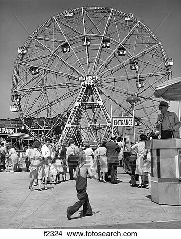 1950S People Lining Up To Ride Wonder Wheel Ferris Wheel Coney Island Ny Usa View Large Photo Image Picture - 1950S People Lining Up To Ride Wonder Wheel Ferris Wheel Coney Island Ny Usa. Fotosearch
