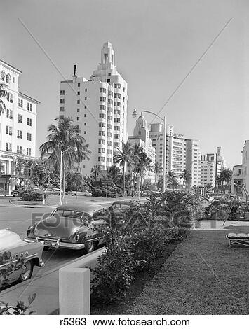 1950s SAXONY AND SAN SOUCI HOTELS ARE VISIBLE COLLINS AVENUE MIAMI BEACH FLORIDA USA View Large Photo Image Stock Image - 1950s SAXONY AND SAN SOUCI HOTELS ARE VISIBLE COLLINS AVENUE MIAMI BEACH FLORIDA USA. Fotosearch