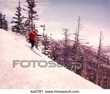 1960s 1960s MAN SKIING SKI DOWN MOUNTAIN TREES EVERGREEN SOME BARREN View Large Photo Image Stock Image - 1960s 1960s MAN SKIING SKI DOWN MOUNTAIN TREES EVERGREEN SOME BARREN. Fotosearch