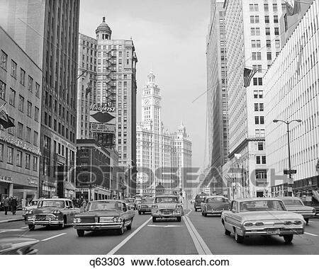 1960s 1963 CHICAGO IL USA MICHIGAN AVENUE TRAFFIC WRIGLEY BUILDING View Large Photo Image Stock Image - 1960s 1963 CHICAGO IL USA MICHIGAN AVENUE TRAFFIC WRIGLEY BUILDING. Fotosearch
