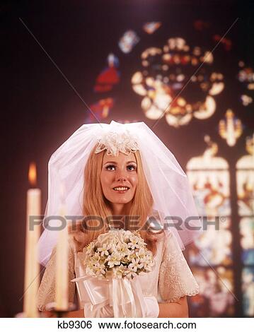 1960S 1970S Bride Portrait Church Holding Bouquet Flowers Flower Brides Woman Women Wedding Religion View Large Photo Image Stock Photograph - 1960S 1970S Bride Portrait Church Holding Bouquet Flowers Flower Brides Woman Women Wedding Religion. Fotosearch
