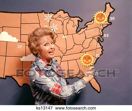 1960s 1970s DEMONSTRATIVE WOMAN TV FORECASTER GIVING WEATHER REPORT POINTING TO MAP LOOKING AT CAMERA View Large Photo Image Stock Photo - 1960s 1970s DEMONSTRATIVE WOMAN TV FORECASTER GIVING WEATHER REPORT POINTING TO MAP LOOKING AT CAMERA. Fotosearch