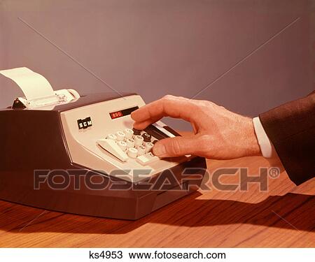 1960s 1970s MAN HAND USING ELECTRIC OFFICE EQUIPMENT CALCULATOR ADDING MACHINE View Large Photo Image Stock Image - 1960s 1970s MAN HAND USING ELECTRIC OFFICE EQUIPMENT CALCULATOR ADDING MACHINE. Fotosearch