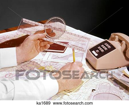 1960s 1970s MAN PILOT HANDS PLOTTING MAPPING PRIVATE AIRPLANE TRAVEL FLIGHT PLAN View Large Photo Image Stock Photo - 1960s 1970s MAN PILOT HANDS PLOTTING MAPPING PRIVATE AIRPLANE TRAVEL FLIGHT PLAN. Fotosearch