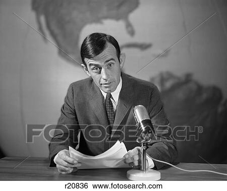 1960s 1970s NEWSMAN READING NEWS FROM PAPERS LOOKING AT CAMERA SPEAKING INTO MICROPHONE WORLD MAP BEHIND View Large Photo Image Stock Photograph - 1960s 1970s NEWSMAN READING NEWS FROM PAPERS LOOKING AT CAMERA SPEAKING INTO MICROPHONE WORLD MAP BEHIND. Fotosearch