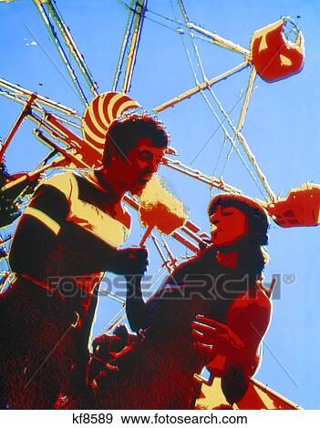 1960s 1970s POSTERIZED IMAGE OF COUPLE EATING COTTON CANDY AMUSEMENT PARK FERRIS WHEEL View Large Photo Image Stock Photo - 1960s 1970s POSTERIZED IMAGE OF COUPLE EATING COTTON CANDY AMUSEMENT PARK FERRIS WHEEL. Fotosearch