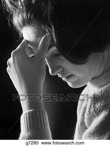1960S 1970S Woman Holding Her Forehead In Her Hand Headache Tired Depressed Sad View Large Photo Image Stock Photography - 1960S 1970S Woman Holding Her Forehead In Her Hand Headache Tired Depressed Sad. Fotosearch