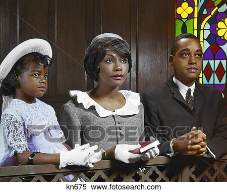 1960s AFRICAN AMERICAN FAMILY IN CHURCH WEARING SUNDAY BEST EASTER CLOTHES AND HATS View Large Photo Image Stock Photography - 1960s AFRICAN AMERICAN FAMILY IN CHURCH WEARING SUNDAY BEST EASTER CLOTHES AND HATS. Fotosearch