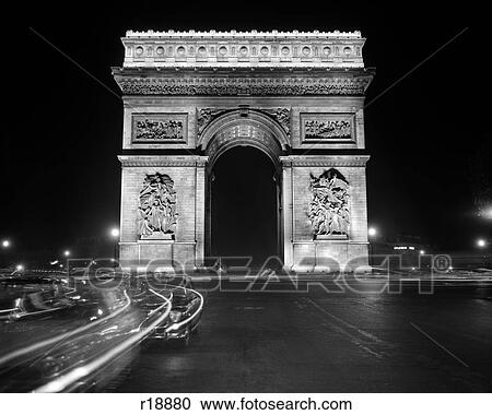 Stock Image - 1960s ARC DE TRIOMPHE DE L'TOILE AT NIGHT PARIS FRANCE. Fotosearch
