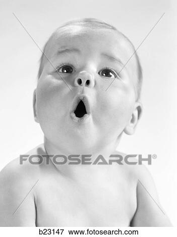 1960S Baby Making Funny Face Mouth Open Looking Up Expression Surprise Awe Wonder View Large Photo Image Stock Photo - 1960S Baby Making Funny Face Mouth Open Looking Up Expression Surprise Awe Wonder . Fotosearch