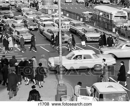 1960S Busy Intersection Cars Traffic Pedestrians Times Square Broadway And West 45Th Street New York City Usa View Large Photo Image Stock Photo - 1960S Busy Intersection Cars Traffic Pedestrians Times Square Broadway And West 45Th Street New York City Usa. Fotosearch