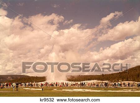 1960s CROWD WATCHING OLD FAITHFUL GEYSER YELLOWSTONE NATIONAL PARK PARKS WYOMING USA View Large Photo Image Stock Image - 1960s CROWD WATCHING OLD FAITHFUL GEYSER YELLOWSTONE NATIONAL PARK PARKS WYOMING USA. Fotosearch