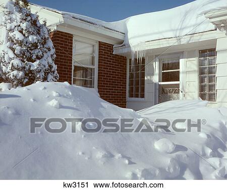 1960s DEEP WINTER SNOW PILED UP BLOCKING FRONT DOOR OF BRICK SUBURBAN HOUSE View Large Photo Image Stock Image - 1960s DEEP WINTER SNOW PILED UP BLOCKING FRONT DOOR OF BRICK SUBURBAN HOUSE. Fotosearch