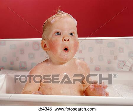 1960s EXCITED SURPRISED BABY IN BATHTUB SUDS ON HEAD AND FUNNY FACIAL EXPRESSION View Large Photo Image Stock Photography - 1960s EXCITED SURPRISED BABY IN BATHTUB SUDS ON HEAD AND FUNNY FACIAL EXPRESSION. Fotosearch