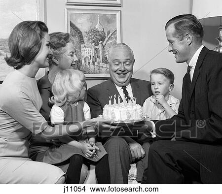 1960s FAMILY BIRTHDAY PARTY CAKE 3 GENERATIONS View Large Photo Image Picture - 1960s FAMILY BIRTHDAY PARTY CAKE 3 GENERATIONS. Fotosearch