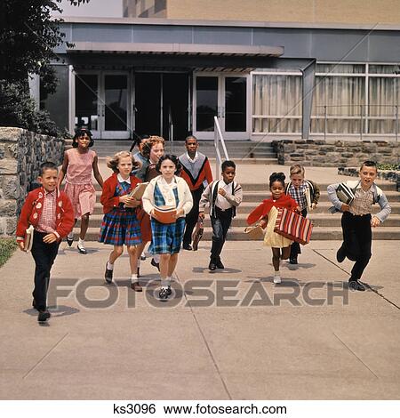 1960s GROUP OF SCHOOL CHILDREN RUNNING DOWN STEPS AWAY FROM SCHOOL BUILDING View Large Photo Image Stock Photograph - 1960s GROUP OF SCHOOL CHILDREN RUNNING DOWN STEPS AWAY FROM SCHOOL BUILDING. Fotosearch