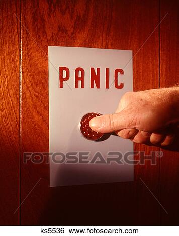 Stock Photograph - 1960s MALE HAND PUSHING PANIC BUTTON. Fotosearch