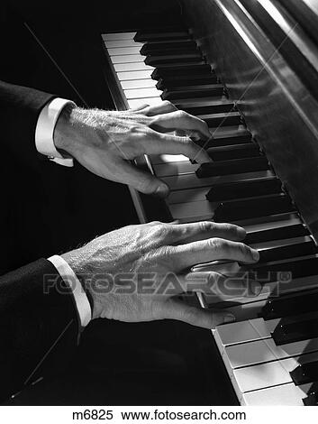 1960s MALE HANDS PLAYING PIANO View Large Photo Image Stock Photography - 1960s MALE HANDS PLAYING PIANO. Fotosearch
