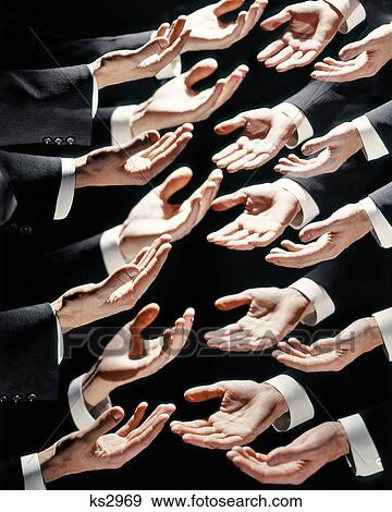 Stock Photo - 1960s MULTIPLE EXPOSURE OF MALE HANDS OFFERING A HELPING HAND OR ASKING FOR HELP MONEY WELCOME WITH OPEN HANDS. Fotosearch