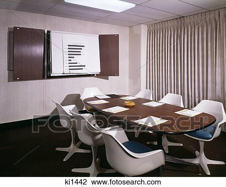 1960S Office Conference Room With Table Chairs Writing Pads And Wall Chart View Large Photo Image Stock Image - 1960S Office Conference Room With Table Chairs Writing Pads And Wall Chart . Fotosearch