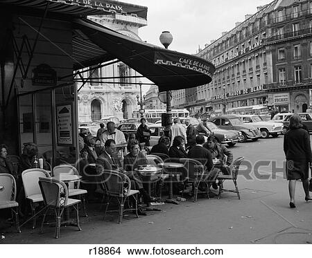 1960S Patrons At Cafe De La Paix Sidewalk Cafe Corner Of Paris Opera House In Background Paris France View Large Photo Image Picture - 1960S Patrons At Cafe De La Paix Sidewalk Cafe Corner Of Paris Opera House In Background Paris France . Fotosearch