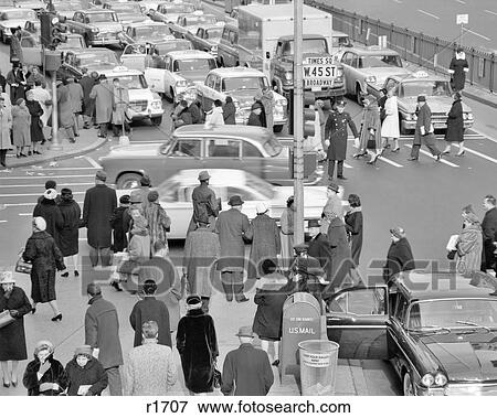 1960S Pedestrians Traffic Times Square West 45Th Street And Broadway New York City Usa View Large Photo Image Stock Photo - 1960S Pedestrians Traffic Times Square West 45Th Street And Broadway New York City Usa. Fotosearch