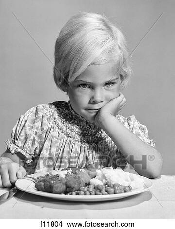 1960S Sad Blonde Girl Unhappy With Food Dinner Plate With Peas Mashed Potatoes Chicken View Large Photo Image Picture - 1960S Sad Blonde Girl Unhappy With Food Dinner Plate With Peas Mashed Potatoes Chicken. Fotosearch