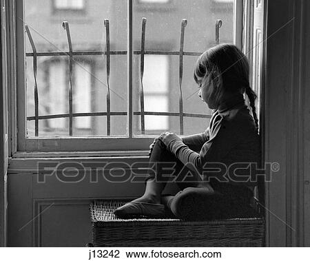 1960S Sad Lonely Girl Looking Out Through City Apartment Window With Metal Security Bars View Large Photo Image Stock Image - 1960S Sad Lonely Girl Looking Out Through City Apartment Window With Metal Security Bars . Fotosearch