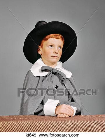 1960s SERIOUS BOY DRESSED IN PILGRIM CLOTHES COSTUME FOR THANKSGIVING SCHOOL PLAY View Large Photo Image Stock Photography - 1960s SERIOUS BOY DRESSED IN PILGRIM CLOTHES COSTUME FOR THANKSGIVING SCHOOL PLAY. Fotosearch