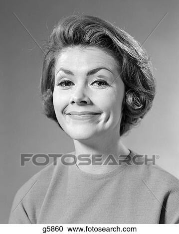 1960s SMILING BRUNETTE WOMAN WITH HAPPY SUBLIME FACIAL EXPRESSION AND DIMPLES LOOKING AT CAMERA View Large Photo Image Stock Image - 1960s SMILING BRUNETTE WOMAN WITH HAPPY SUBLIME FACIAL EXPRESSION AND DIMPLES LOOKING AT CAMERA. Fotosearch