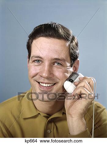 1960s SMILING MAN SHAVING WITH ELECTRIC RAZOR LOOKING AT CAMERA View Large Photo Image Picture - 1960s SMILING MAN SHAVING WITH ELECTRIC RAZOR LOOKING AT CAMERA. Fotosearch