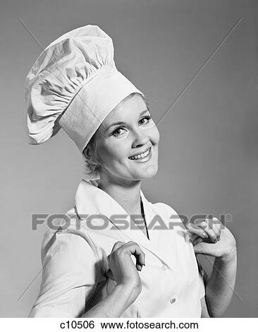 1960S Smiling Proud Woman Wearing Chef'S Chefs Hat Toque Looking At Camera View Large Photo Image Stock Photograph - 1960S Smiling Proud Woman Wearing Chef'S Chefs Hat Toque Looking At Camera. Fotosearch