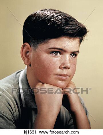 1960s TEEN BOY PORTRAIT RESTING HIS HEAD IN HIS HANDS THOUGHTFUL POSE THINKING View Large Photo Image Stock Image - 1960s TEEN BOY PORTRAIT RESTING HIS HEAD IN HIS HANDS THOUGHTFUL POSE THINKING. Fotosearch