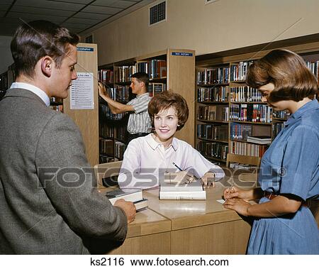 1960s TEEN STUDENTS IN HIGH SCHOOL LIBRARY View Large Photo Image Stock Photograph - 1960s TEEN STUDENTS IN HIGH SCHOOL LIBRARY. Fotosearch