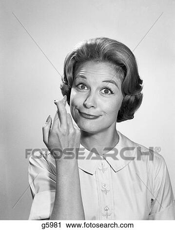 1960s WOMAN FUNNY FACIAL EXPRESSION WITH FINGERS CROSSED FOR LUCK LOOKING AT CAMERA View Large Photo Image Stock Image - 1960s WOMAN FUNNY FACIAL EXPRESSION WITH FINGERS CROSSED FOR LUCK LOOKING AT CAMERA. Fotosearch