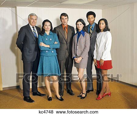 1970s 6 BUSINESS OFFICE PROFESSIONALS STANDING IN A ROW LINE 3 MEN AND 3 WOMEN FULL LENGTH View Large Photo Image Stock Photo - 1970s 6 BUSINESS OFFICE PROFESSIONALS STANDING IN A ROW LINE 3 MEN AND 3 WOMEN FULL LENGTH. Fotosearch