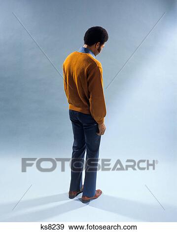 1970s AFRICAN-AMERICAN MAN BACK TO CAMERA HEAD DOWN SAD DEPRESSED View Large Photo Image Stock Photo - 1970s AFRICAN-AMERICAN MAN BACK TO CAMERA HEAD DOWN SAD DEPRESSED. Fotosearch