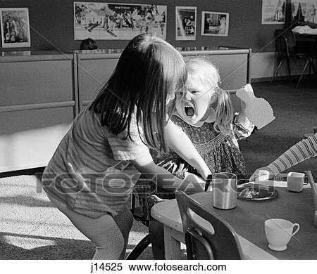 1970S Argument Between Two Pre-School Kindergarten Girls Blonde Girl Screaming View Large Photo Image Stock Photography - 1970S Argument Between Two Pre-School Kindergarten Girls Blonde Girl Screaming . Fotosearch