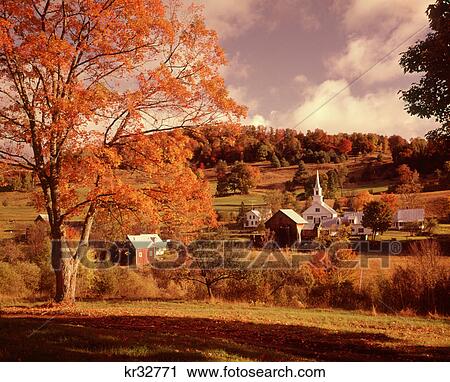Stock Image - 1970s AUTUMN FOLIAGE SEASON SMALL NEW ENGLAND RURAL VILLAGE CHURCH STEEPLE WAITS RIVER VERMONT USA. Fotosearch