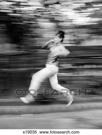 1970S Blurred Motion Shot Of Woman Running Jogging View Large Photo Image Stock Photography - 1970S Blurred Motion Shot Of Woman Running Jogging . Fotosearch