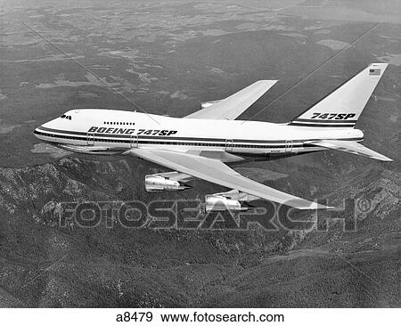 1970s BOEING 747 SP JET AIRPLANE IN FLIGHT View Large Photo Image Stock Photo - 1970s BOEING 747 SP JET AIRPLANE IN FLIGHT. Fotosearch