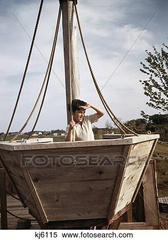1970S Boy Looking Off Into Distance Playground Ships Crows Nest View Large Photo Image Stock Photography - 1970S Boy Looking Off Into Distance Playground Ships Crows Nest. Fotosearch