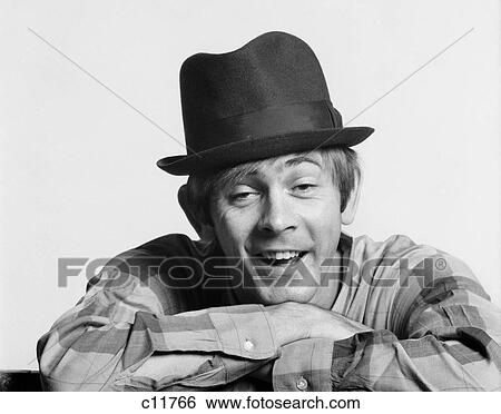 1970S Character Man Wearing Hat Goofy Silly Drunk Facial Expression View Large Photo Image Stock Photograph - 1970S Character Man Wearing Hat Goofy Silly Drunk Facial Expression . Fotosearch