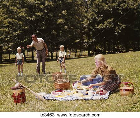 1970s FAMILY PICNIC PLAYING GAME HORSESHOES MOTHER FATHER TWO BOYS SUMMERTIME View Large Photo Image Stock Image - 1970s FAMILY PICNIC PLAYING GAME HORSESHOES MOTHER FATHER TWO BOYS SUMMERTIME. Fotosearch
