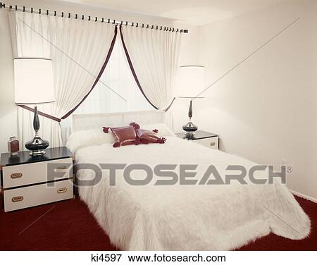 1970s INTERIOR BEDROOM RED CARPET WHITE FURRY BEDSPREAD RED LEATHER PILLOWS View Large Photo Image Stock Photo - 1970s INTERIOR BEDROOM RED CARPET WHITE FURRY BEDSPREAD RED LEATHER PILLOWS. Fotosearch