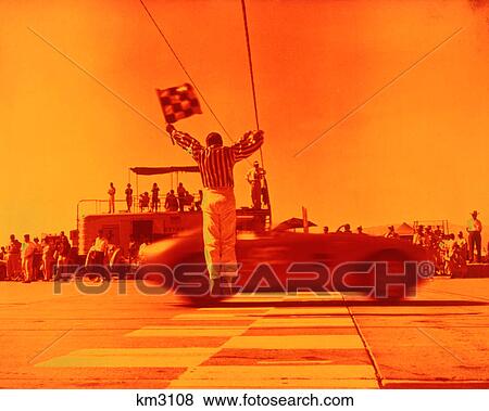 1970s MAN WAVING CHECKERED FLAG AT FINISH LINE END OF SPORTS CAR RACE ORANGE FILTER View Large Photo Image Stock Photo - 1970s MAN WAVING CHECKERED FLAG AT FINISH LINE END OF SPORTS CAR RACE ORANGE FILTER. Fotosearch