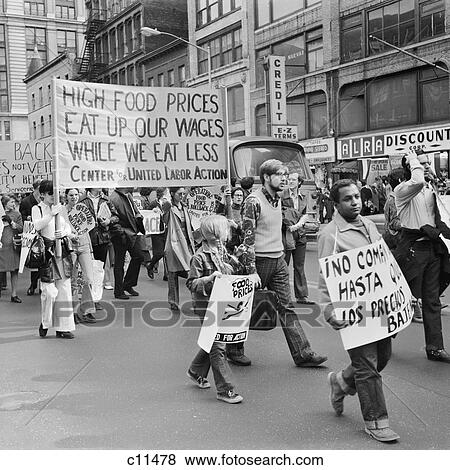 Stock Photo - 1970S People In Demonstration Against High Food Prices Carrying Signs Banners New York City Usa. Fotosearch