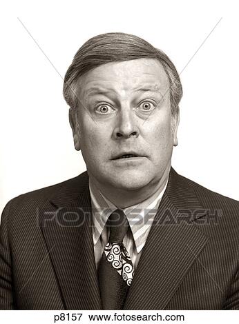 1970s PORTRAIT WIDE EYE BUSINESS MAN FUNNY FACE SHOWING FACIAL EXPRESSION SHOCK SURPRISE STARE FEAR AMAZEMENT WONDER View Large Photo Image Stock Photo - 1970s PORTRAIT WIDE EYE BUSINESS MAN FUNNY FACE SHOWING FACIAL EXPRESSION SHOCK SURPRISE STARE FEAR AMAZEMENT WONDER. Fotosearch